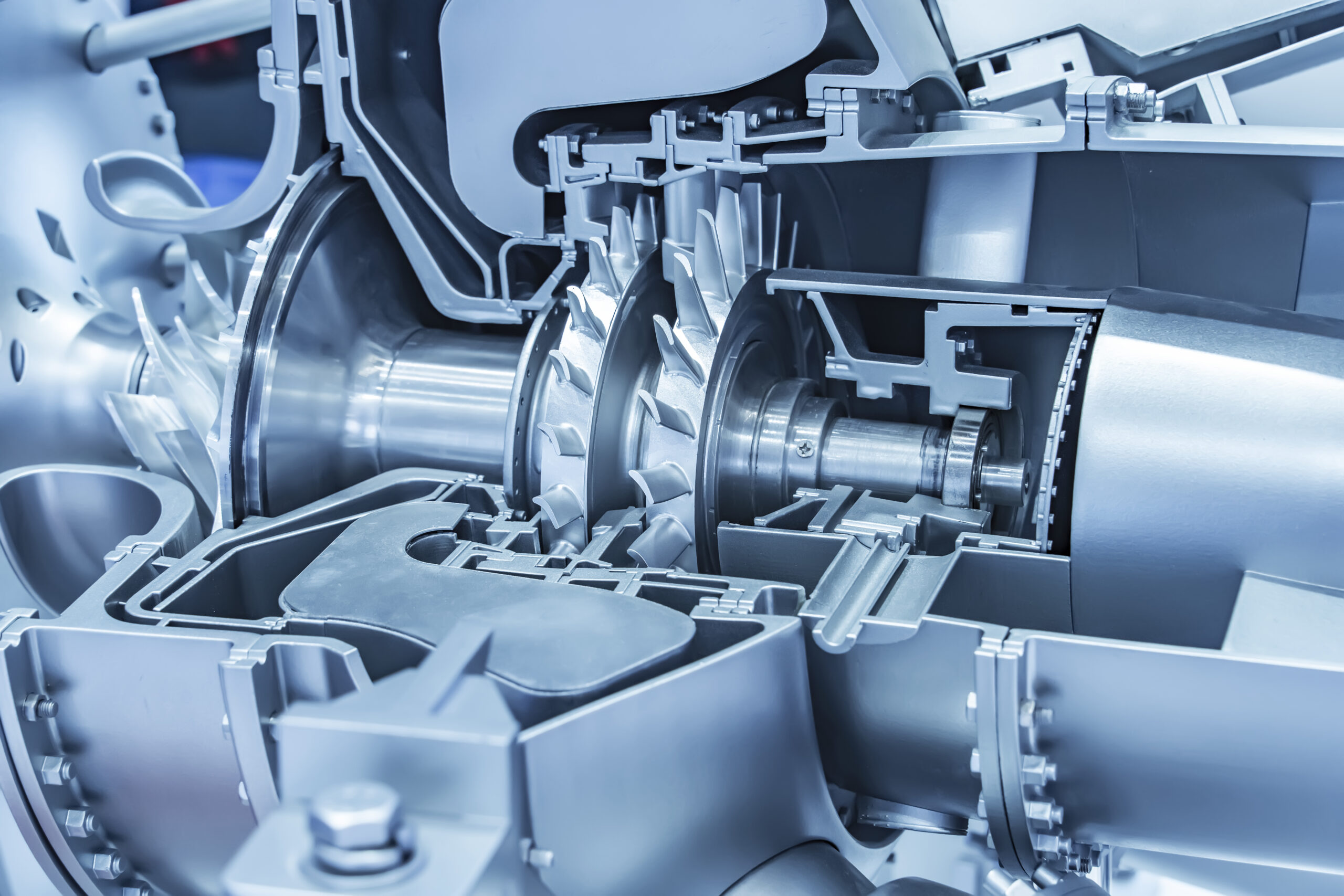 Model of turbine engine with longitudinal section for studying arrangement of blades and combustion chambers